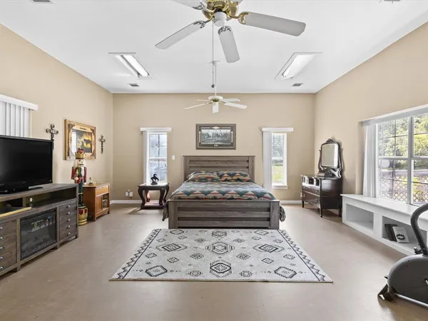 a view of a livingroom with furniture and a table