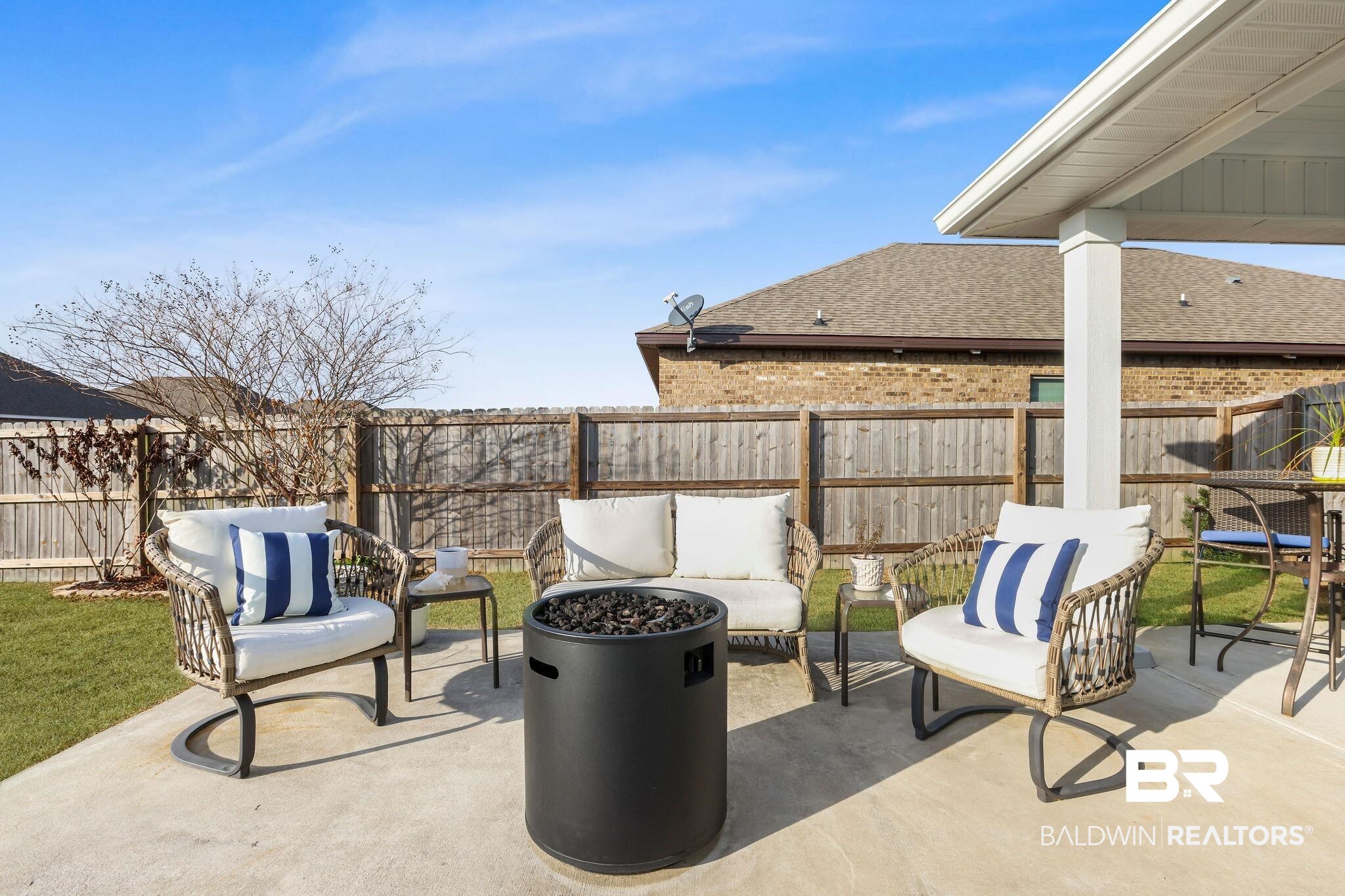 9056 Impala Drive Foley, AL 36535 - Photo 20 of 22 View of patio / terrace with an outdoor living space