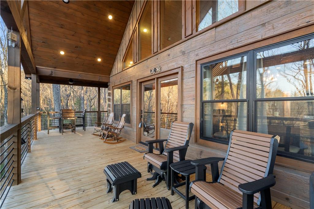 447 Pig Trail Cherry Log, GA 30522 - Photo 14 of 71 a view of a room with lots of furniture and wooden floor