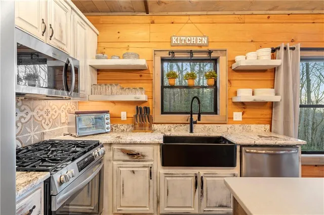 a bathroom with a toilet a sink and a mirror