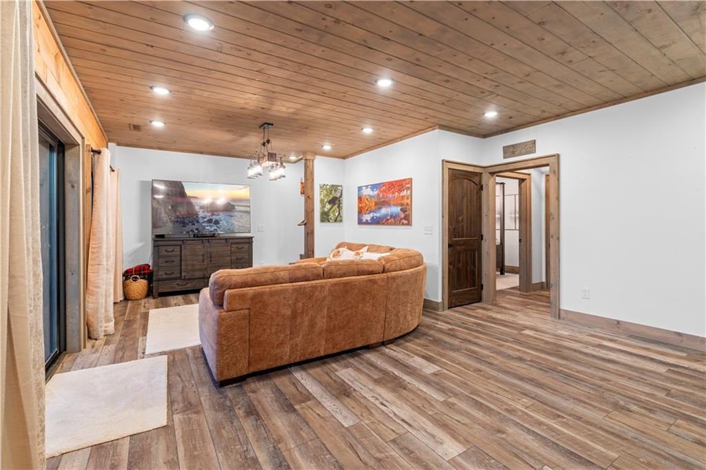 447 Pig Trail Cherry Log, GA 30522 - Photo 52 of 71 a living room with furniture and a table