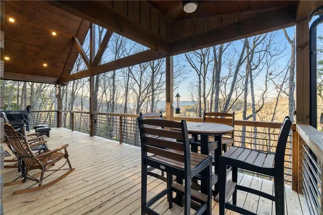 a living room with furniture and a clock
