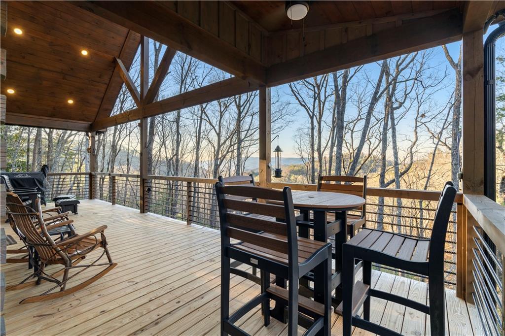 447 Pig Trail Cherry Log, GA 30522 - Photo 10 of 71 a view of a patio with wooden floor