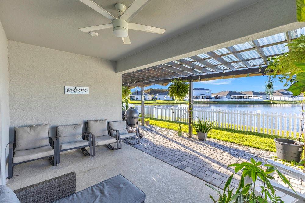 4255 Southern Vista Loop St. Cloud, FL 34772 - Photo 22 of 34 a view of a chairs and table in a patio