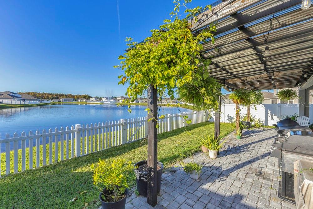 4255 Southern Vista Loop St. Cloud, FL 34772 - Photo 24 of 34 a view of a pathway with a patio