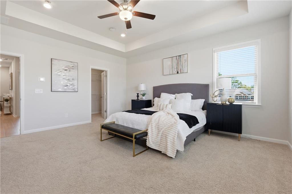 8820 Shipton Circle Ball Ground, GA 30107 - Photo 12 of 40 a bedroom with bed and window