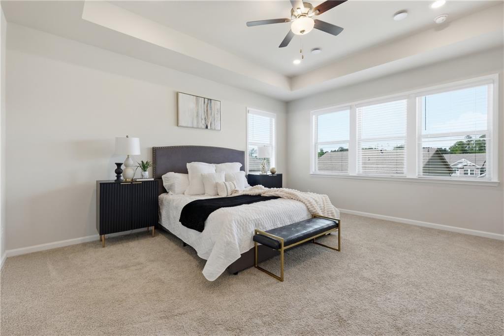 8820 Shipton Circle Ball Ground, GA 30107 - Photo 13 of 40 a bedroom with a bed and a window