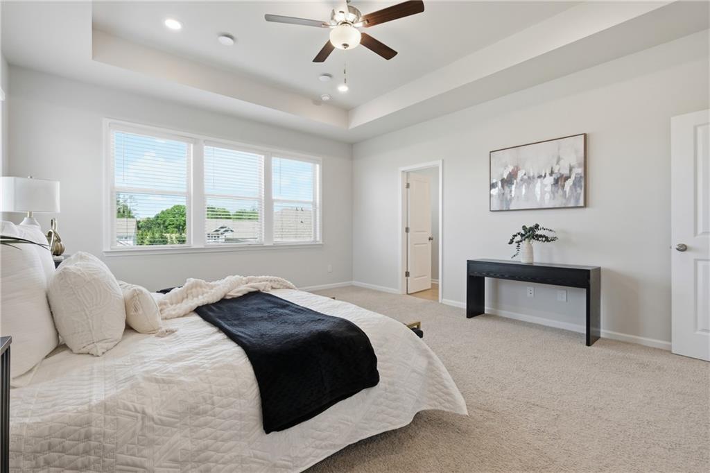 8820 Shipton Circle Ball Ground, GA 30107 - Photo 14 of 40 a bedroom with a bed and window