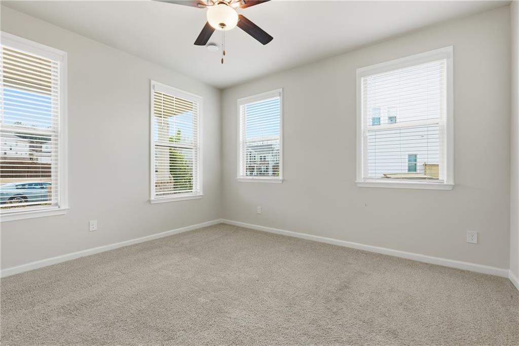 8820 Shipton Circle Ball Ground, GA 30107 - Photo 24 of 40 a view of an empty room with a window