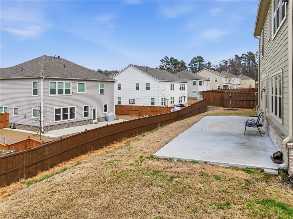 8820 Shipton Circle Ball Ground, GA 30107 - Photo 34 of 40 a front view of a house with a yard