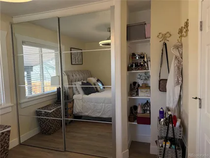 a room with a bed and a window