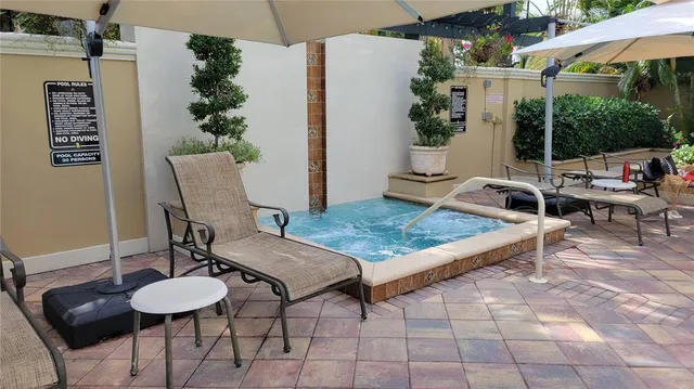 a view of a table and chairs in patio