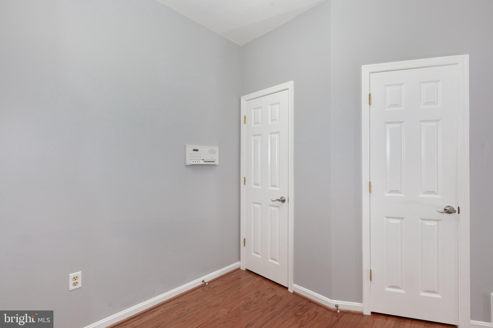 313-3 Sirens Court Odenton, MD 21113 - Photo 10 of 30 wooden floor in an empty room