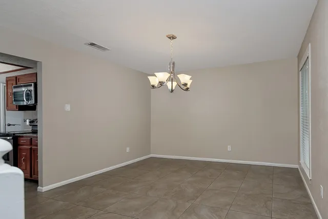 a view of kitchen with a sink
