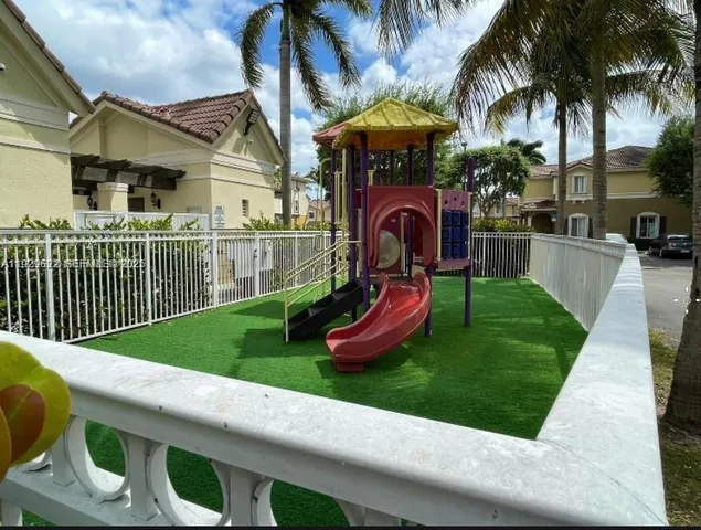 a garden view with a seating space