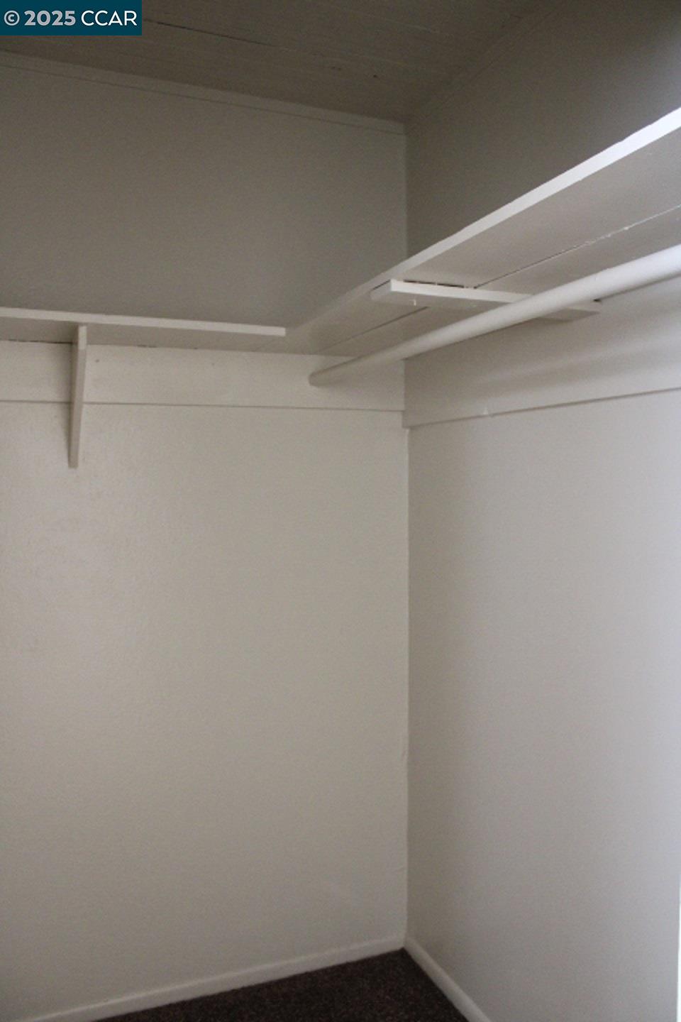 5103 Panama Avenue, Unit A Richmond, CA 94804 - Photo 9 of 10 a view of a room with racks on the wall