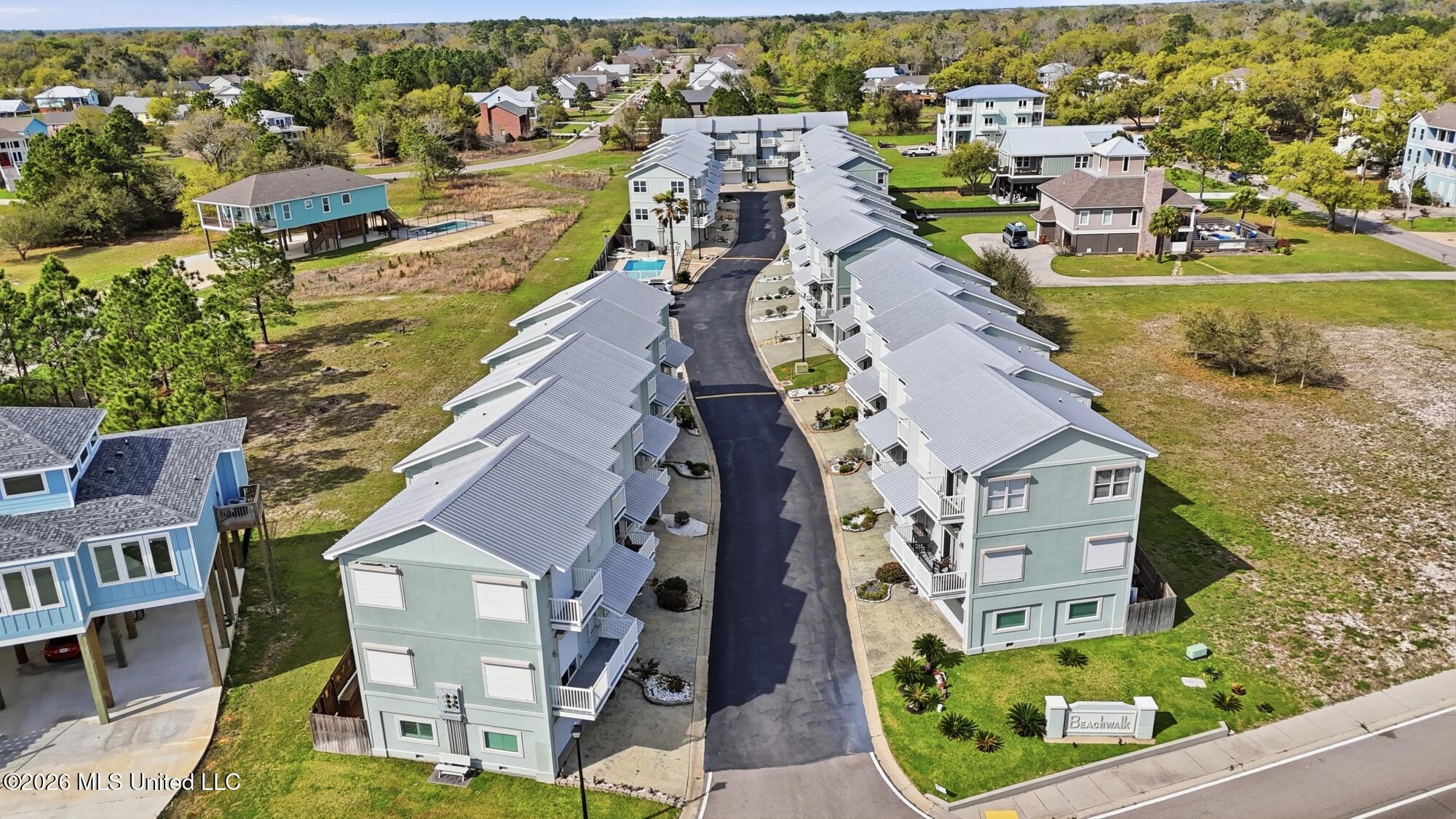705 West Beach Boulevard, Unit 705 Long Beach, MS 39560 - Photo 31 of 35 35_dji_20250914212109_0141_d