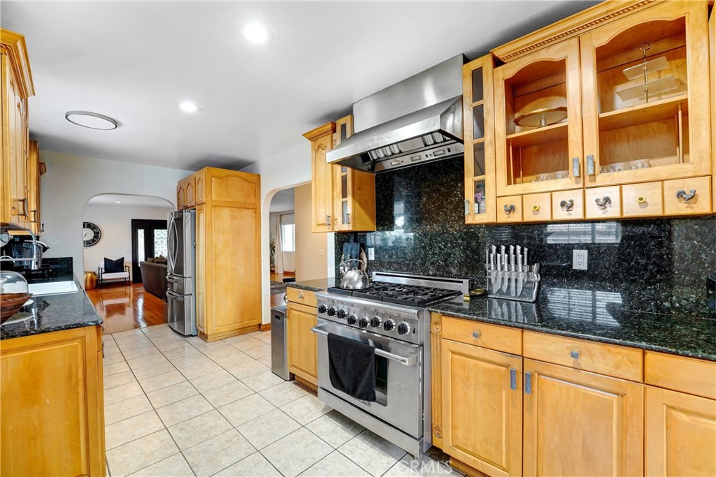 11242 Sheldon Street Sun Valley, CA 91352 - Photo 13 of 15 a kitchen with stainless steel appliances granite countertop a stove and a sink