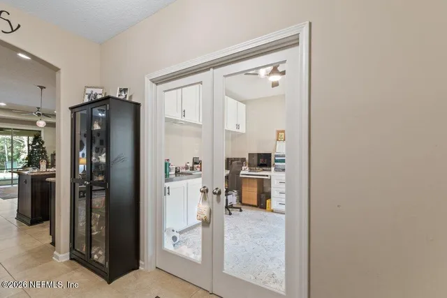a bedroom with bed and window