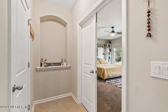 a bathroom with a shower and a sink