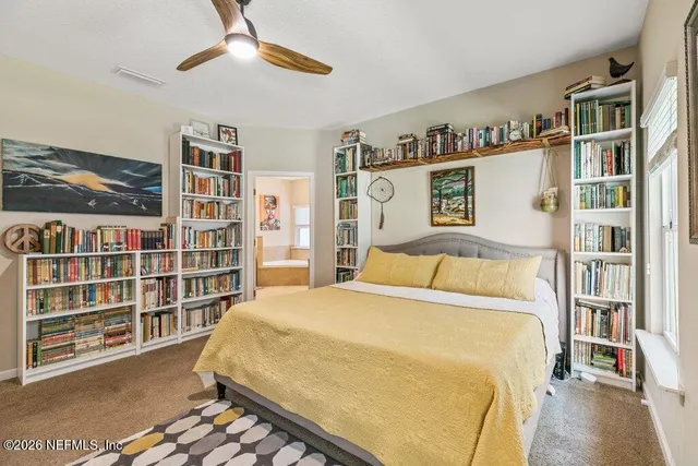 a kitchen with stainless steel appliances granite countertop a stove refrigerator and cabinets