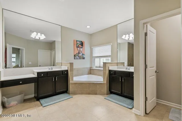 a kitchen with stainless steel appliances granite countertop a sink and stove