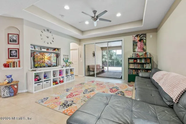 an aerial view of a house with lots of trees