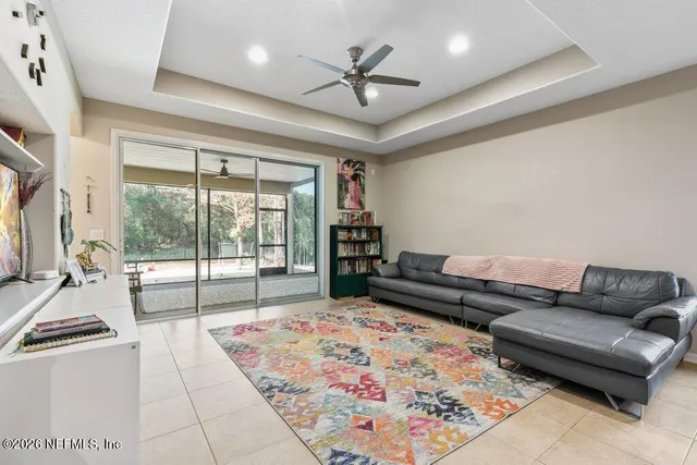 a view of a city with lush green forest