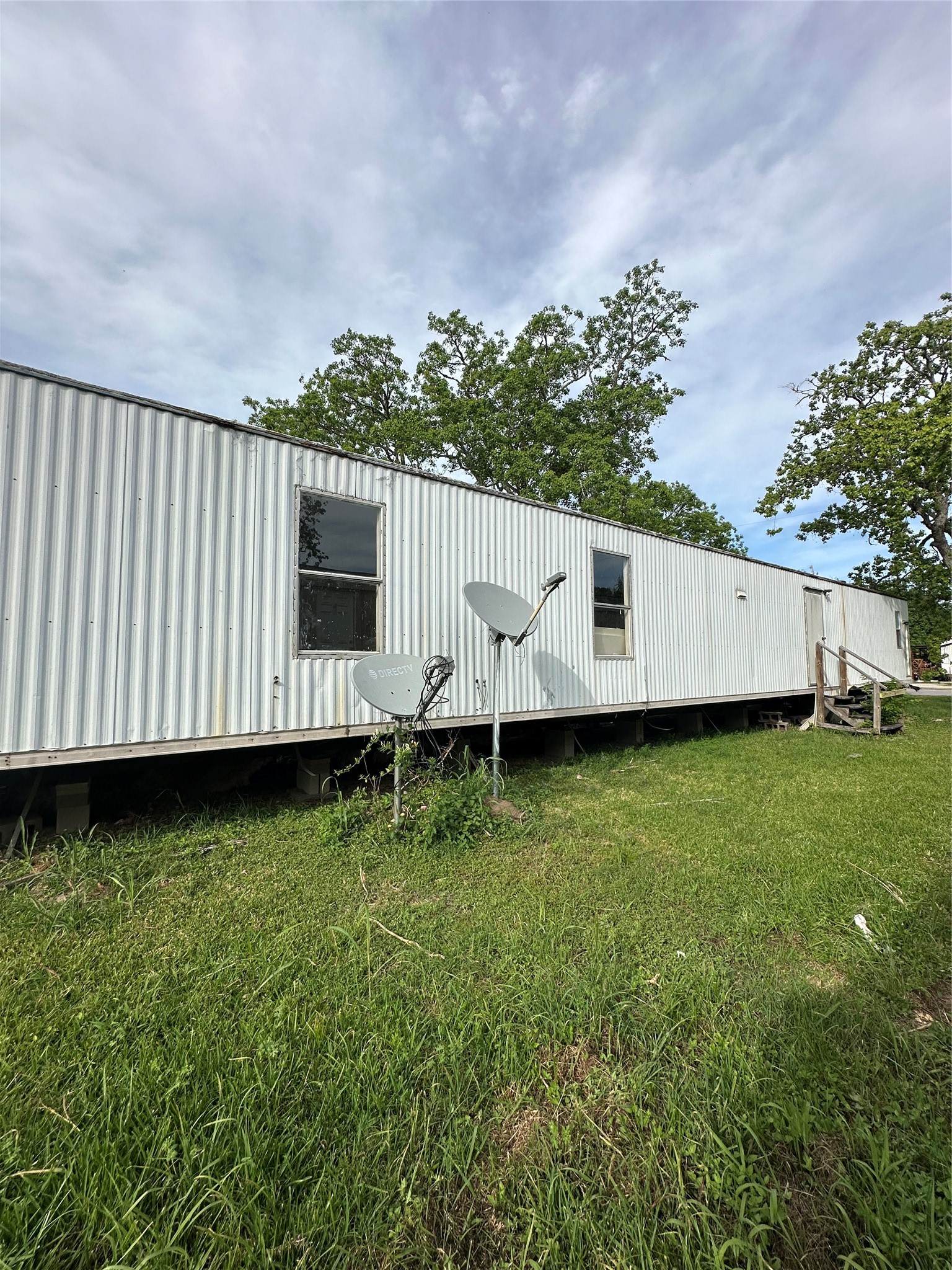 318 4th Street San Leon, TX 77539 - Photo 3 of 10 a view of a backyard with garden