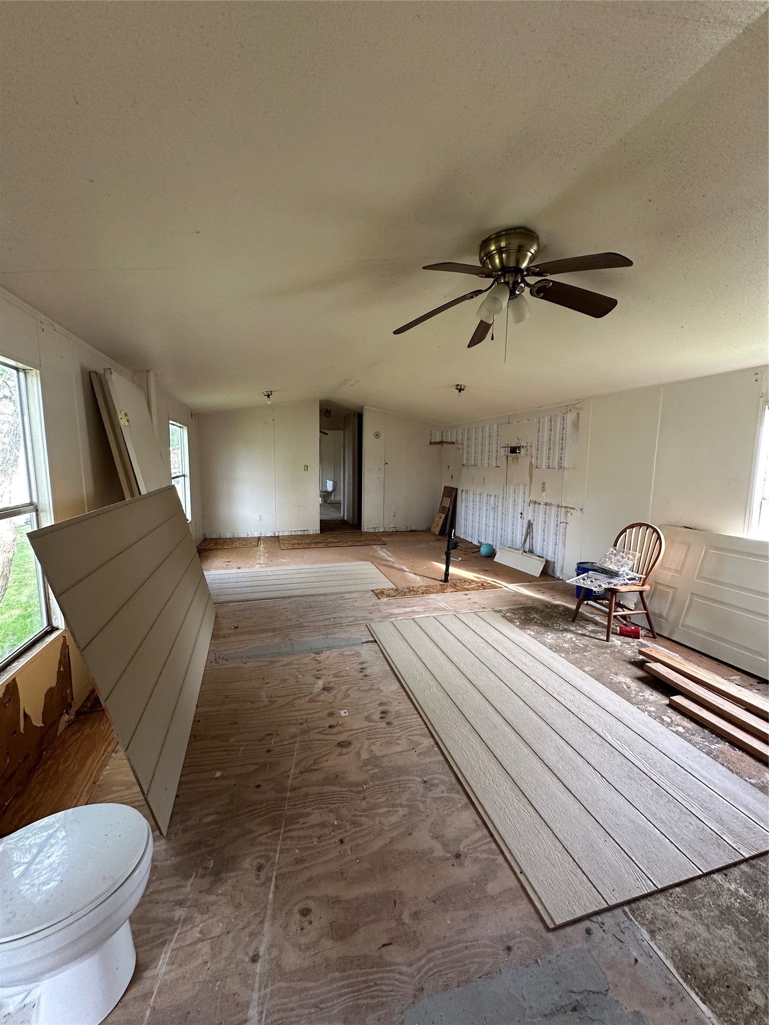 318 4th Street San Leon, TX 77539 - Photo 4 of 10 a bedroom with a bed and a chandelier