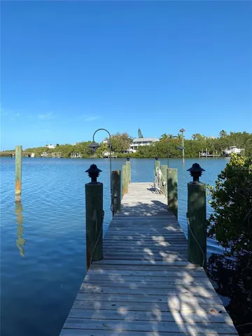 a view of a lake with a garden