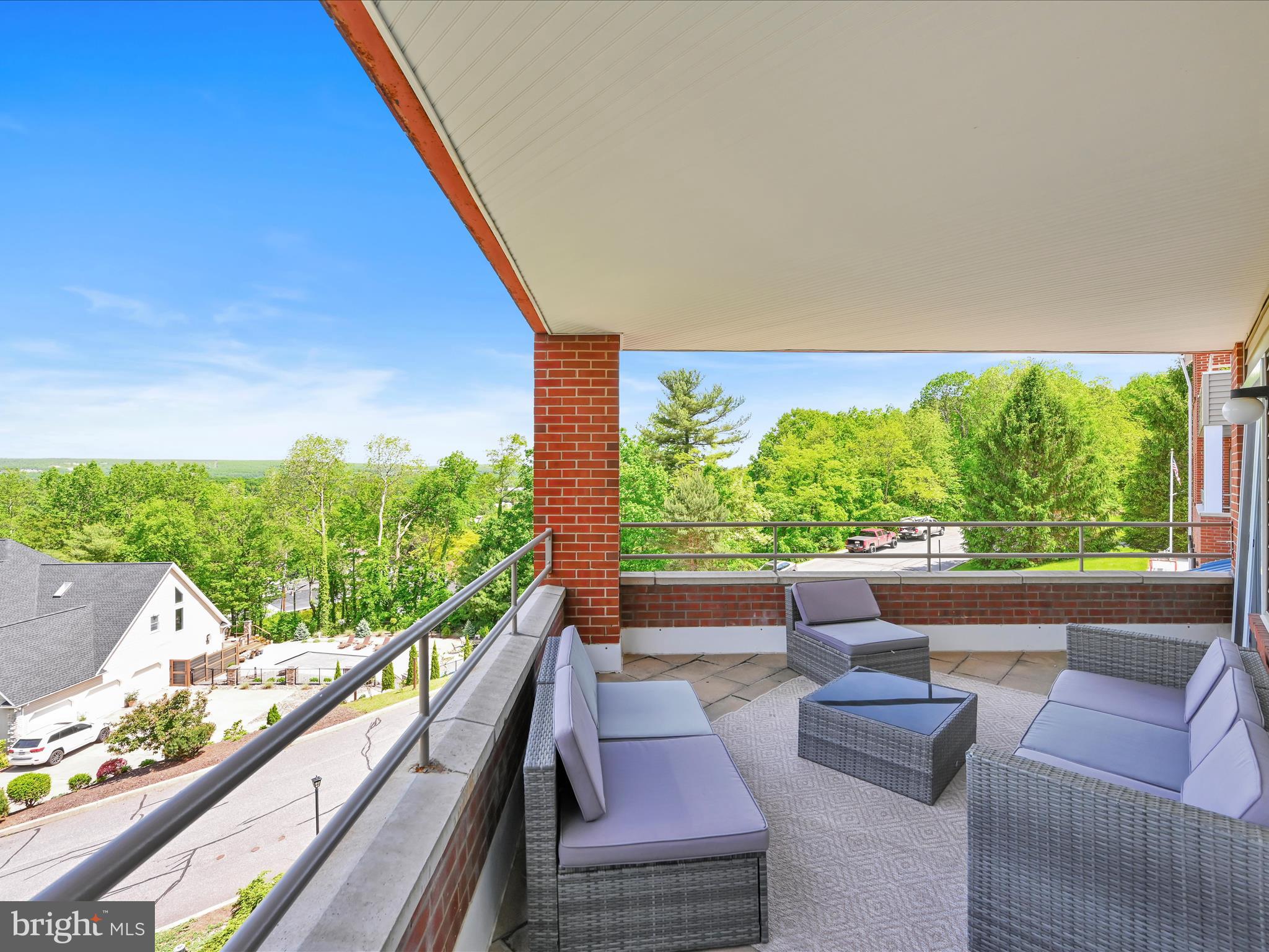 2415 Sharp Mountain Road Pottsville, PA 17901 - Photo 31 of 36 a view of balcony with couches and wooden floor