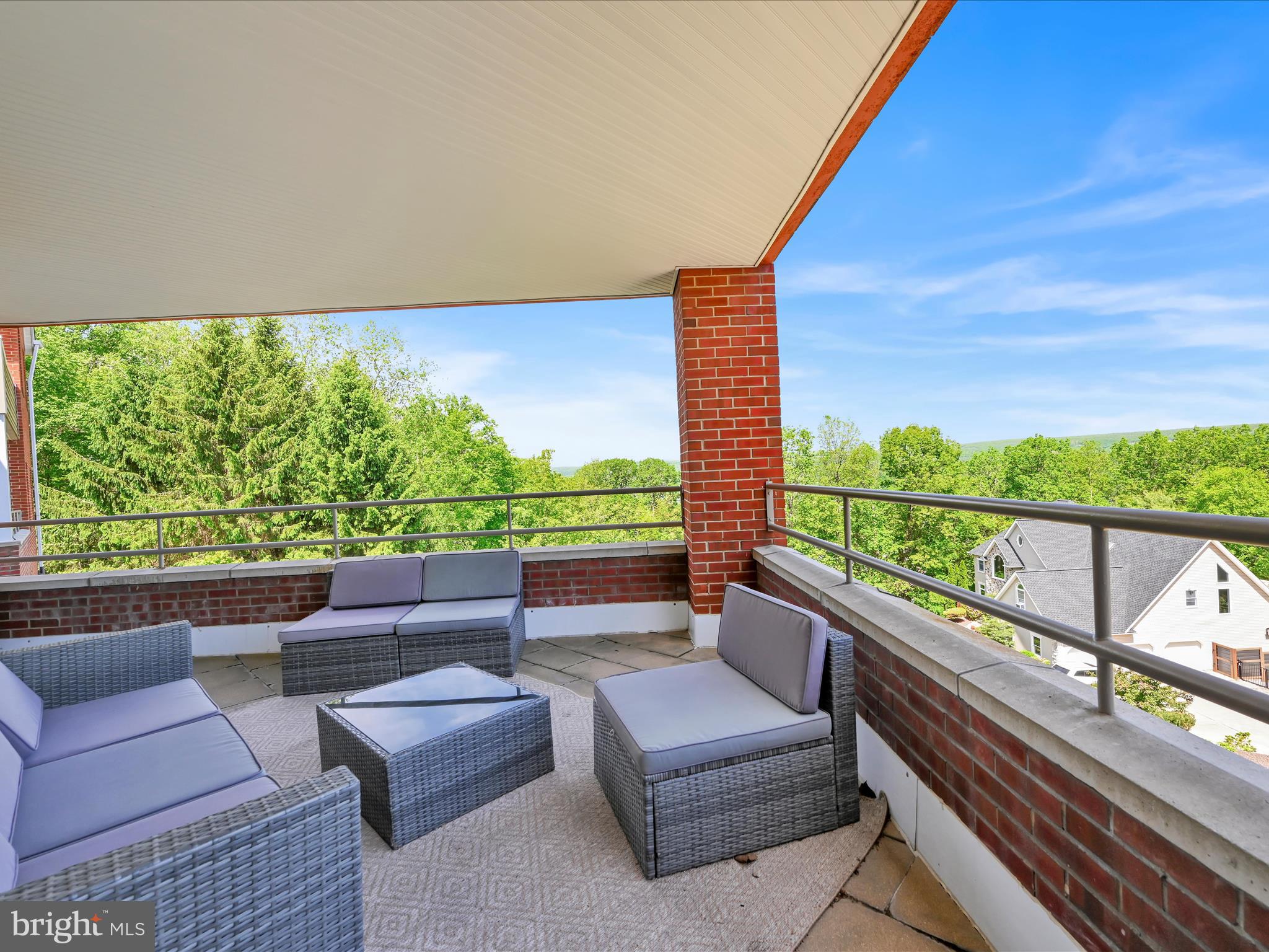 2415 Sharp Mountain Road Pottsville, PA 17901 - Photo 32 of 36 a view of balcony with couches and wooden floor