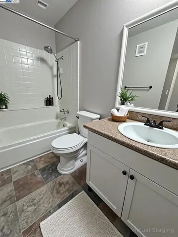 a view of a house with swimming pool and a yard