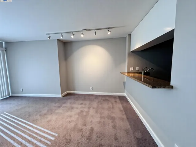 a bedroom with bed and furniture