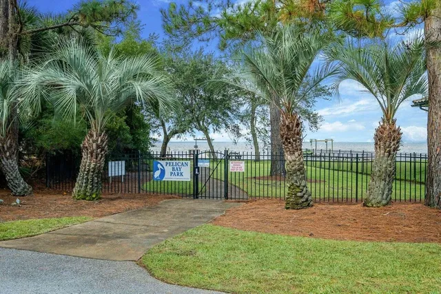 an outdoor sitting area with chairs and a table