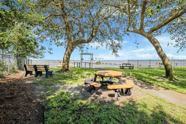 a view of a lake with a big yard