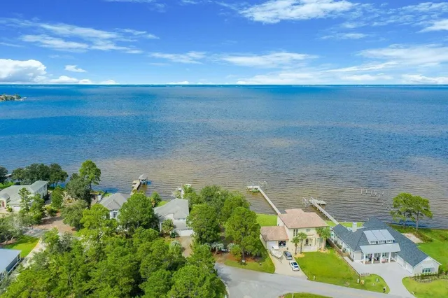 an aerial view of a house with a garden