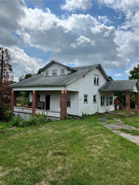 612 Highway 31 Ruffs Dale, PA 15679 - Photo 18 of 18 a view of a house with a big yard and large trees