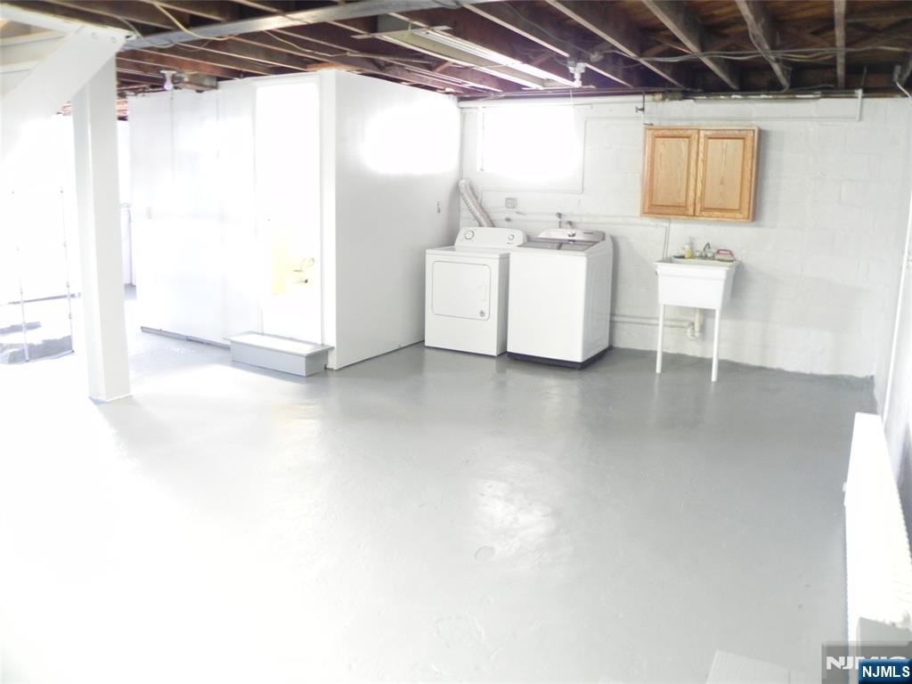 70 Christina Street Little Ferry, NJ 07643 - Photo 10 of 16 a utility room with dryer and washer