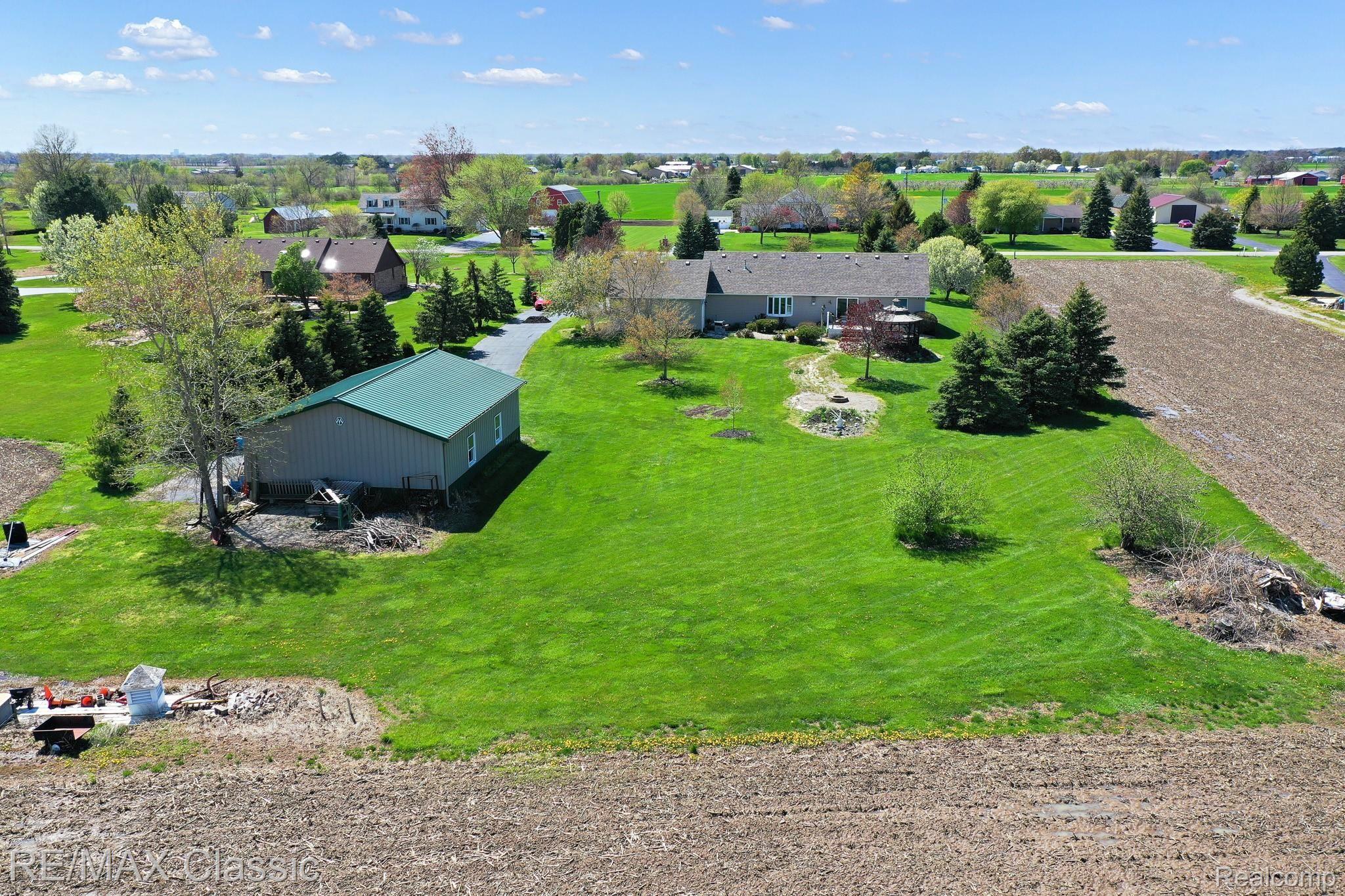 8530 Chinavare Road Newport, MI 48166 - Photo 13 of 34 Back of Home and Pole Barn