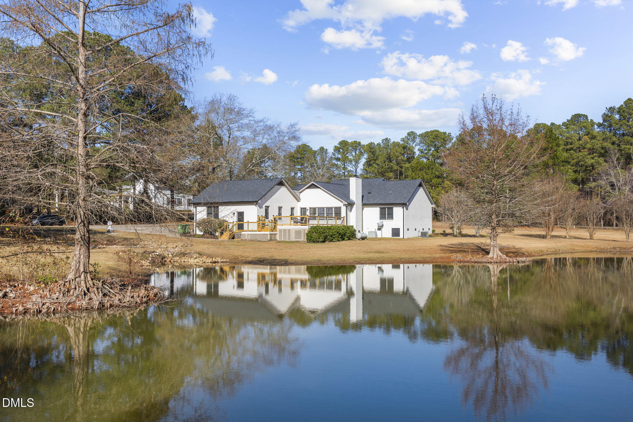 2079 Sheriff Johnson Road Lillington, NC 27546 - Photo 2 of 43 a view of a lake with couches and lake view
