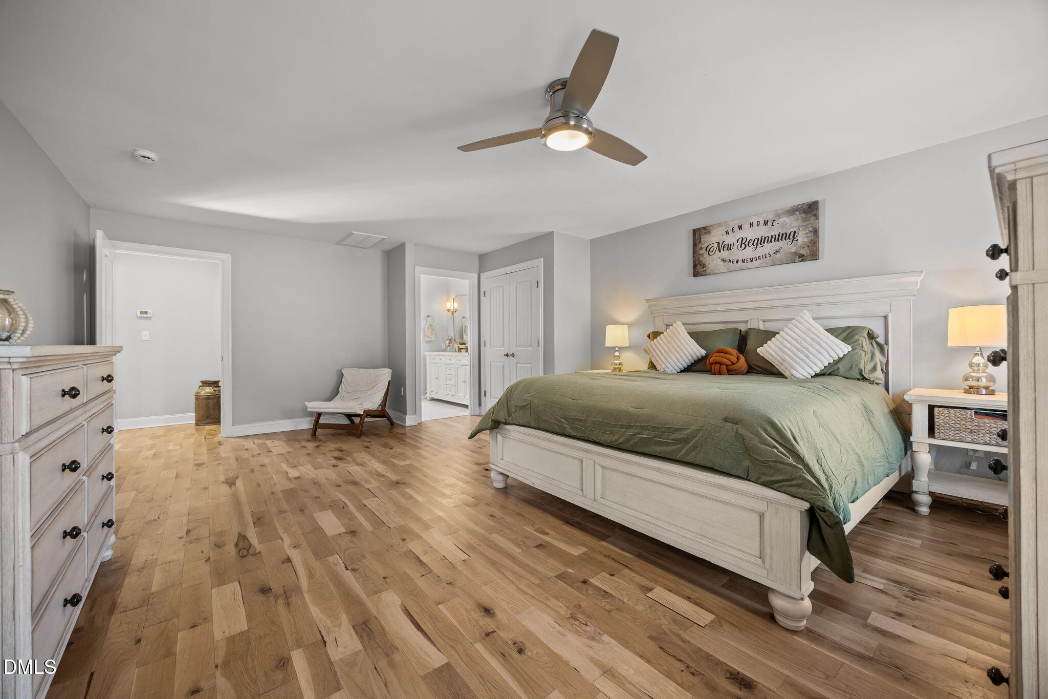 2079 Sheriff Johnson Road Lillington, NC 27546 - Photo 21 of 43 a bedroom with a bed and wooden floor