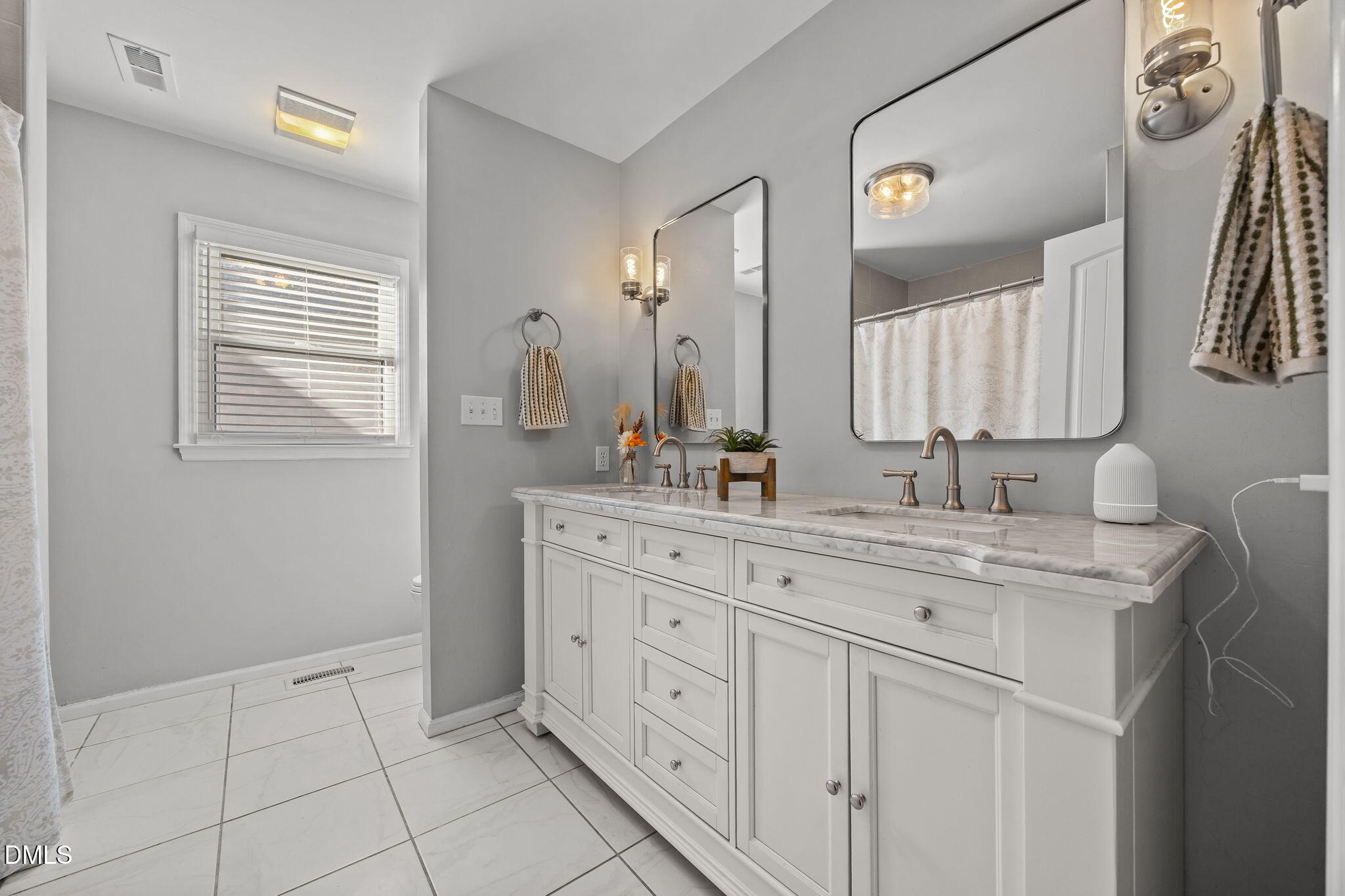 2079 Sheriff Johnson Road Lillington, NC 27546 - Photo 24 of 43 a bathroom with a granite countertop sink a mirror and a shower