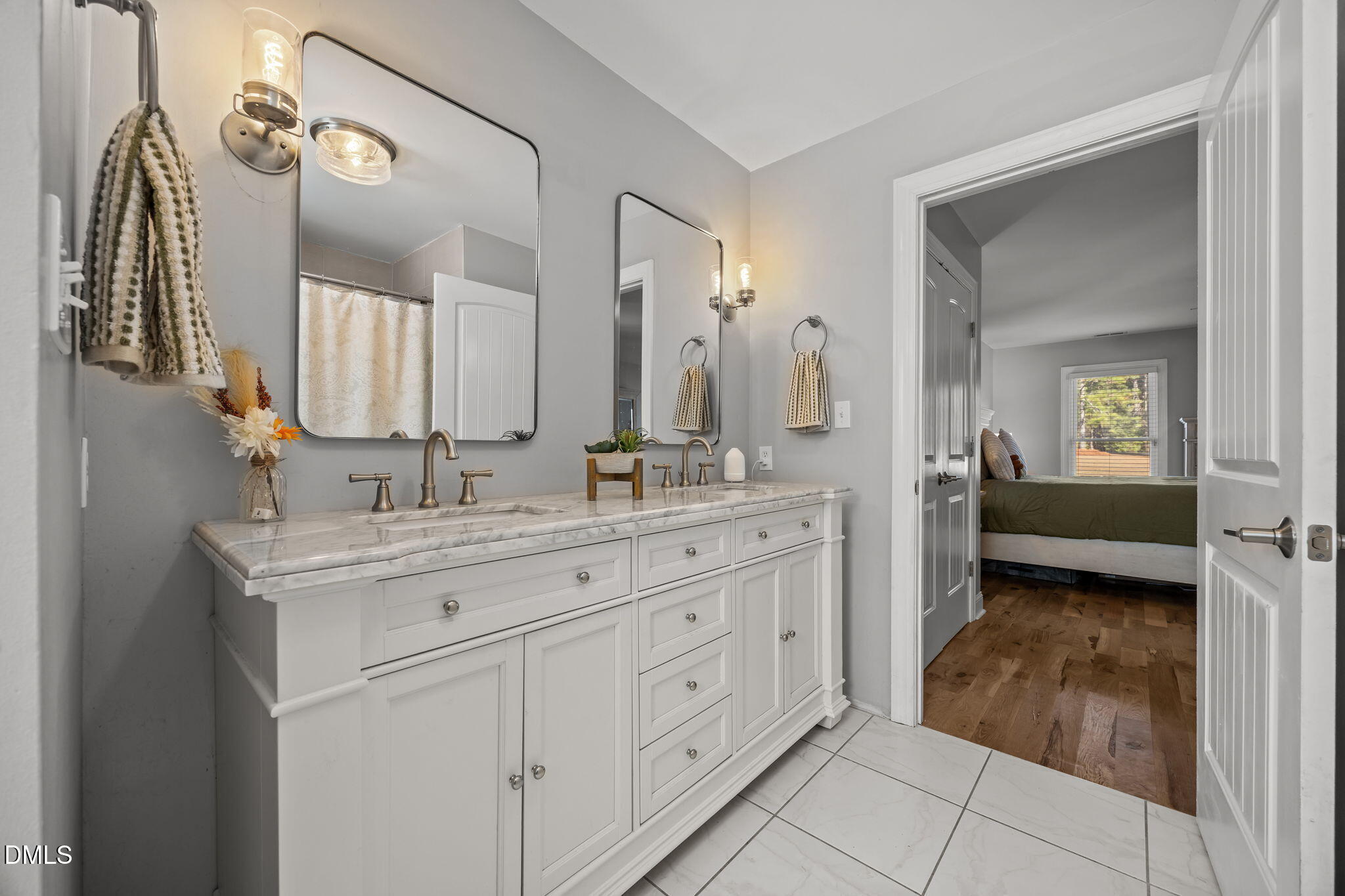 2079 Sheriff Johnson Road Lillington, NC 27546 - Photo 25 of 43 a spacious bathroom with a double vanity sink and a mirror