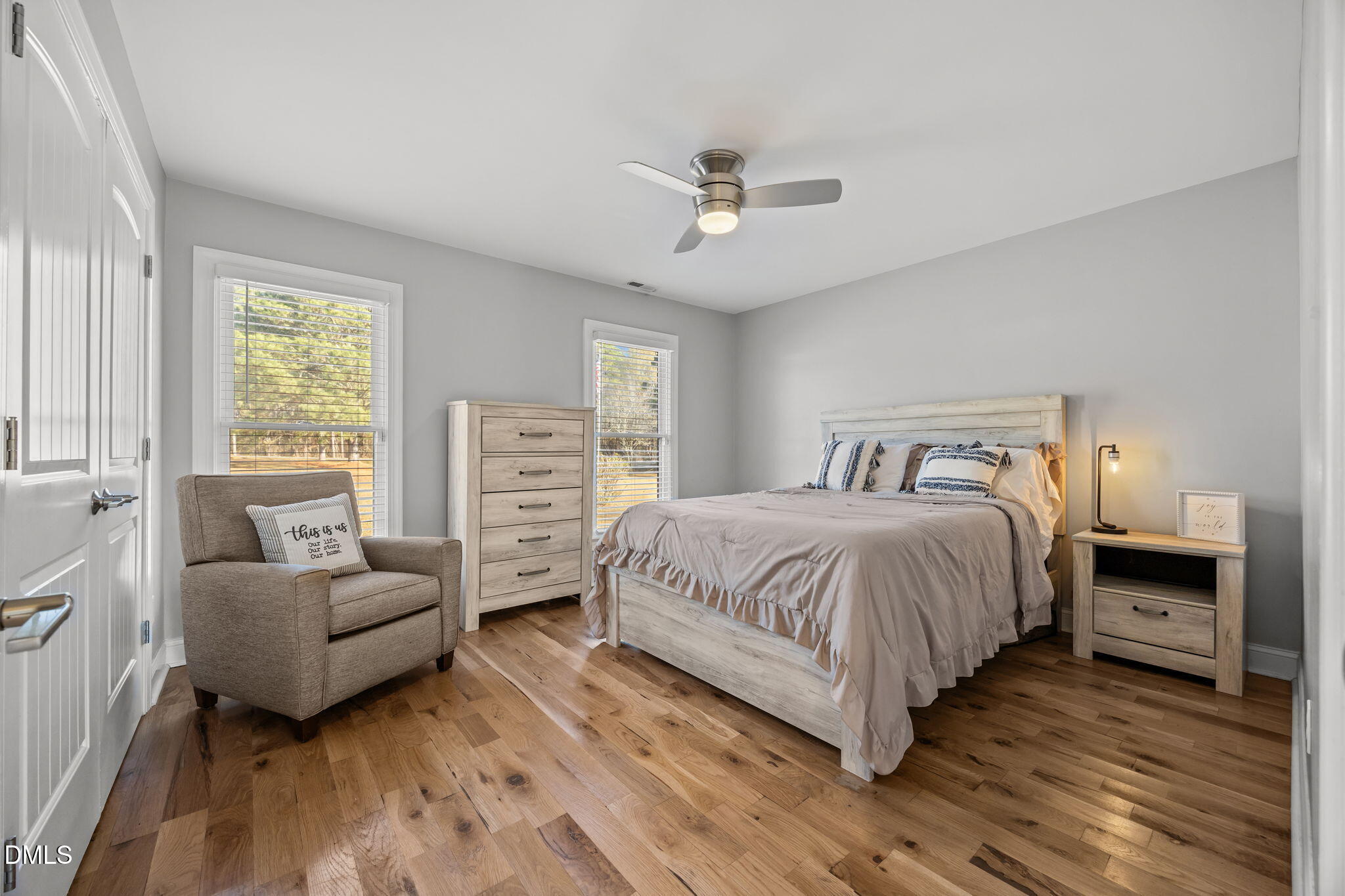 2079 Sheriff Johnson Road Lillington, NC 27546 - Photo 26 of 43 a bedroom with a large bed and a couch