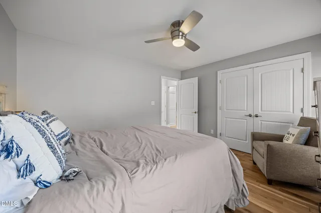 a bedroom with a bed and furniture