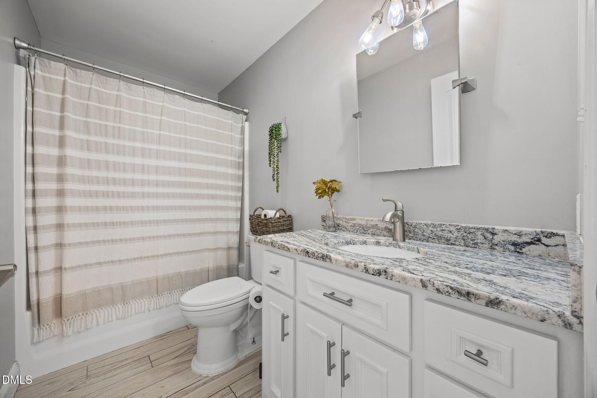 2079 Sheriff Johnson Road Lillington, NC 27546 - Photo 30 of 43 a bathroom with a granite countertop sink toilet and shower