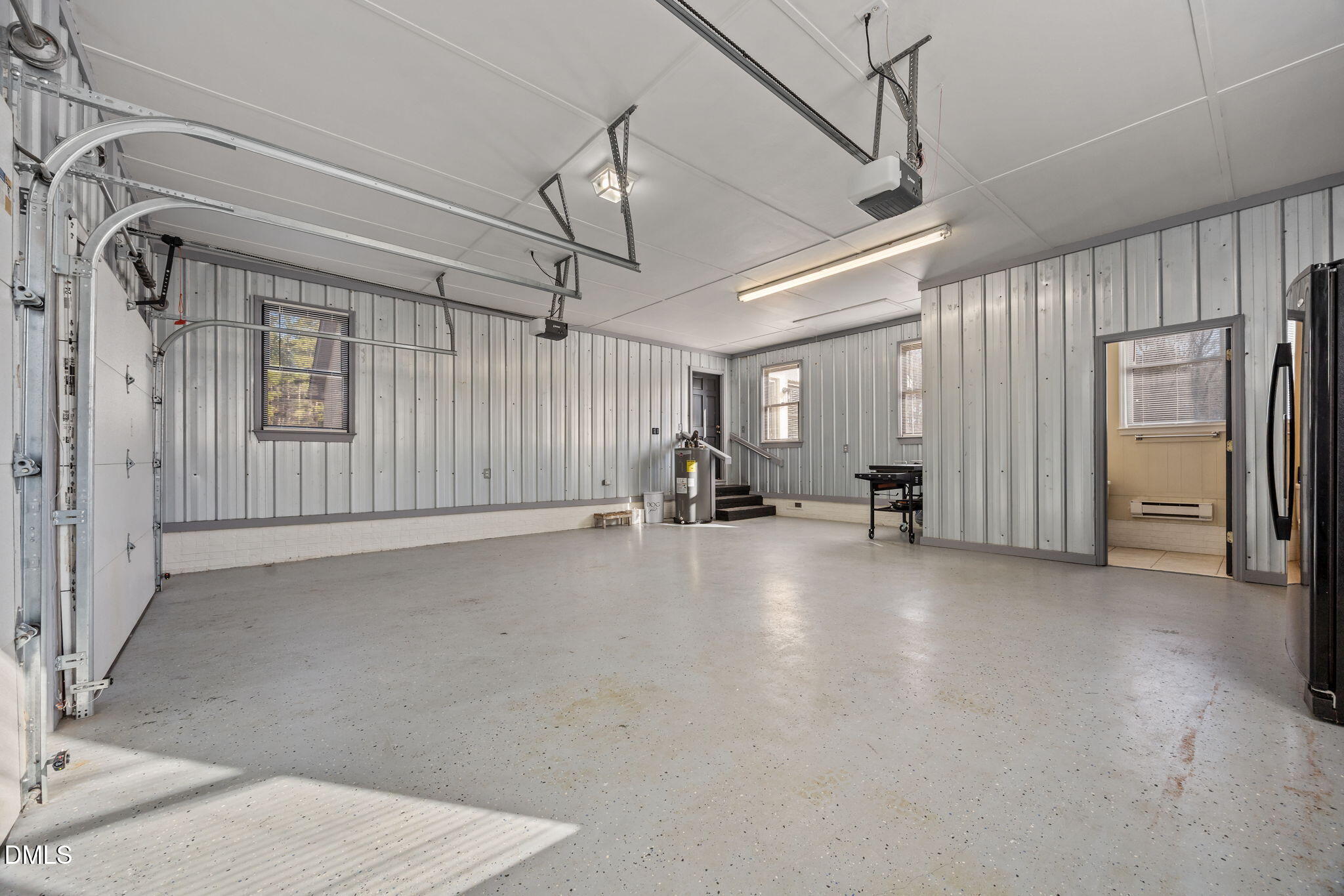 2079 Sheriff Johnson Road Lillington, NC 27546 - Photo 32 of 43 a view of a livingroom with furniture and a ceiling fan