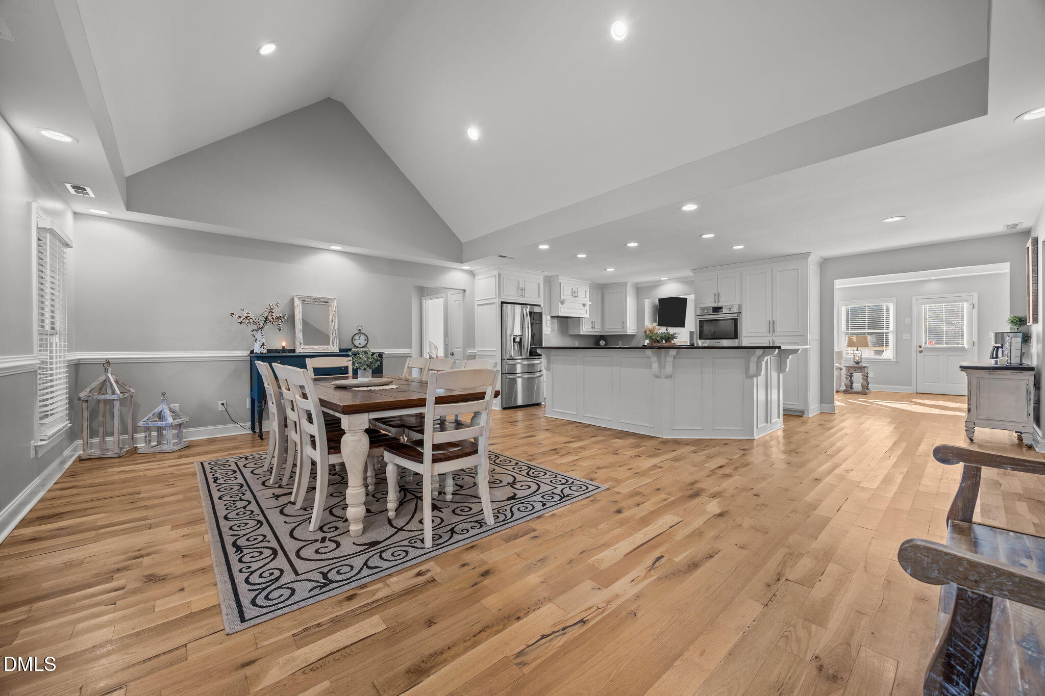 2079 Sheriff Johnson Road Lillington, NC 27546 - Photo 10 of 43 a dining room with furniture and wooden floor